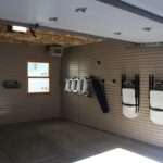 Custom garage with slatwall and accessories for client in Lincoln Park.