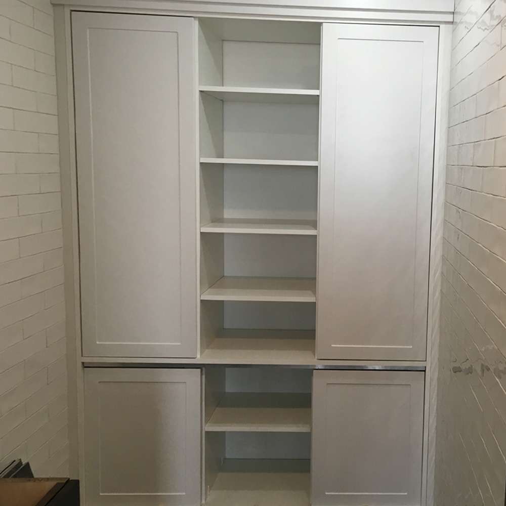 White melamine with Shaker fronts and bath linen cabinet