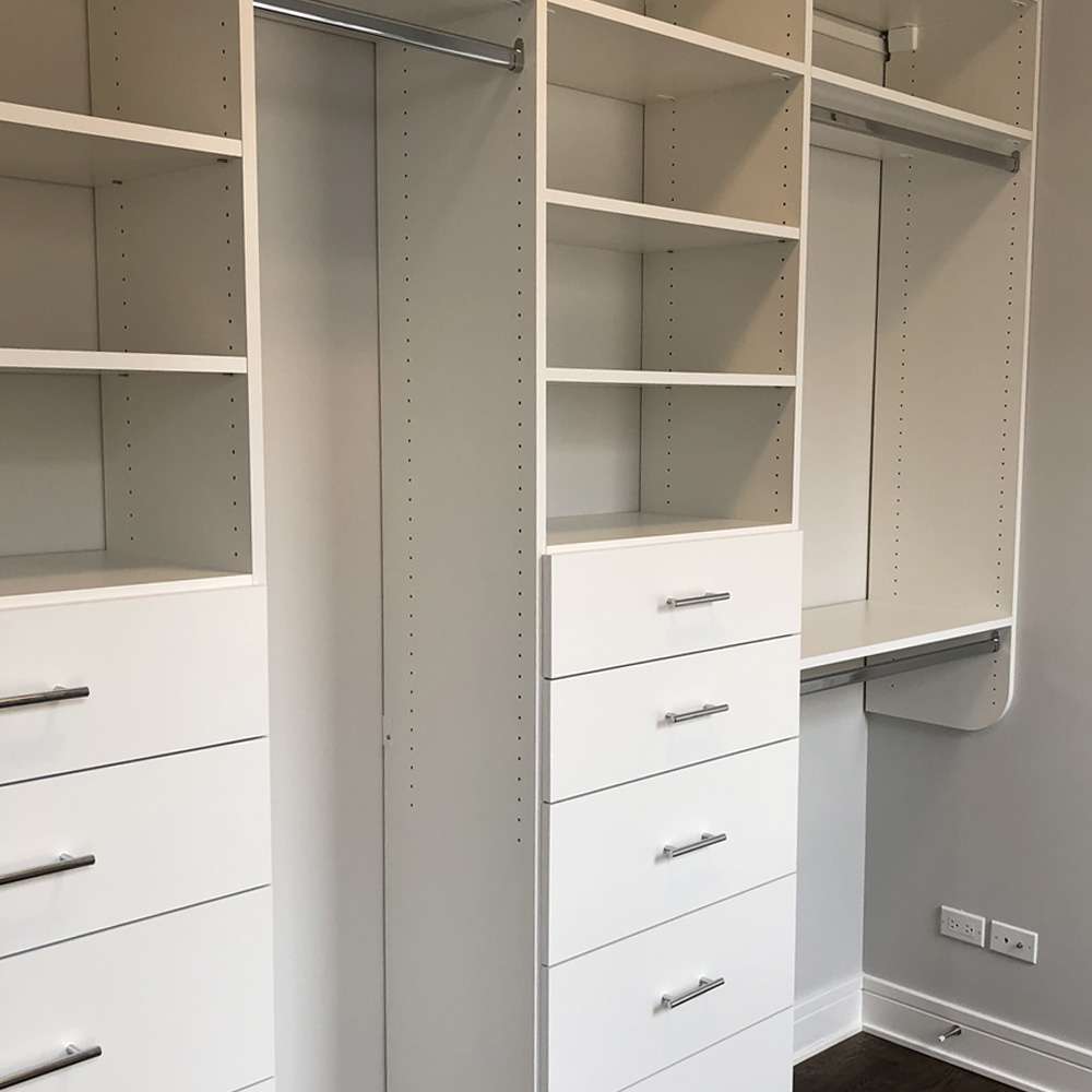 White melamine with Flat fronts, bar pull chrome handles, and hybrid closet