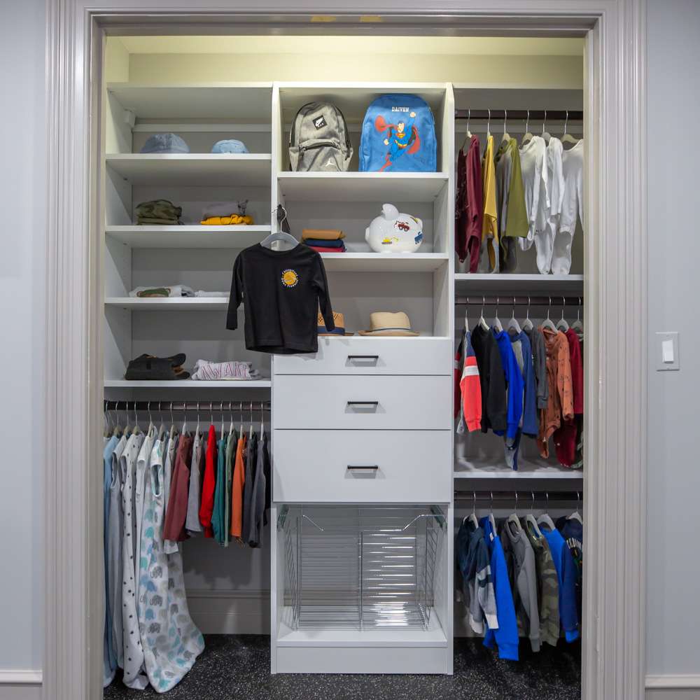 White melamine with flat fronts, square oil handles, and hybrid closet